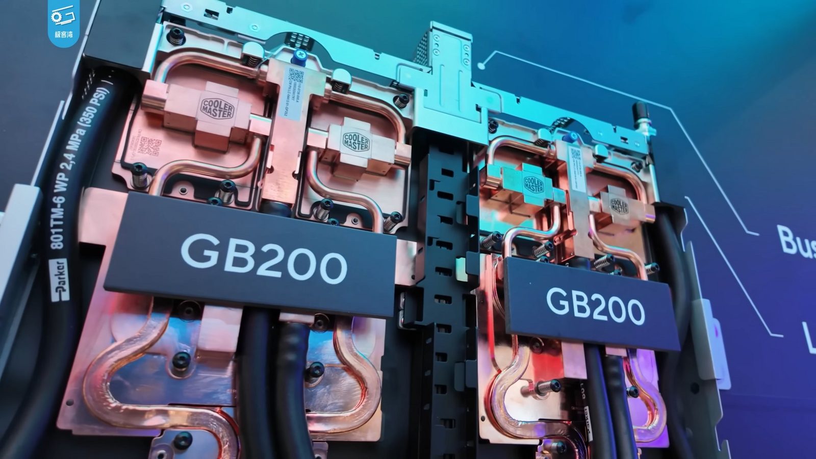 A liquid-cooled NVIDIA GB200 compute tray with copper cold plates and coolant hoses, shown at Computex 2024
